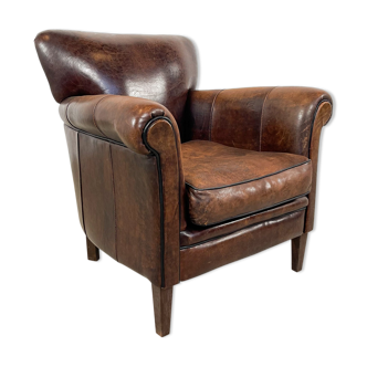 Vintage dark sheep leather club chair Fijnaart