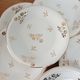 Dessert service, 10 plates and 1 pie dish, in Limoges Porcelain, white and gold