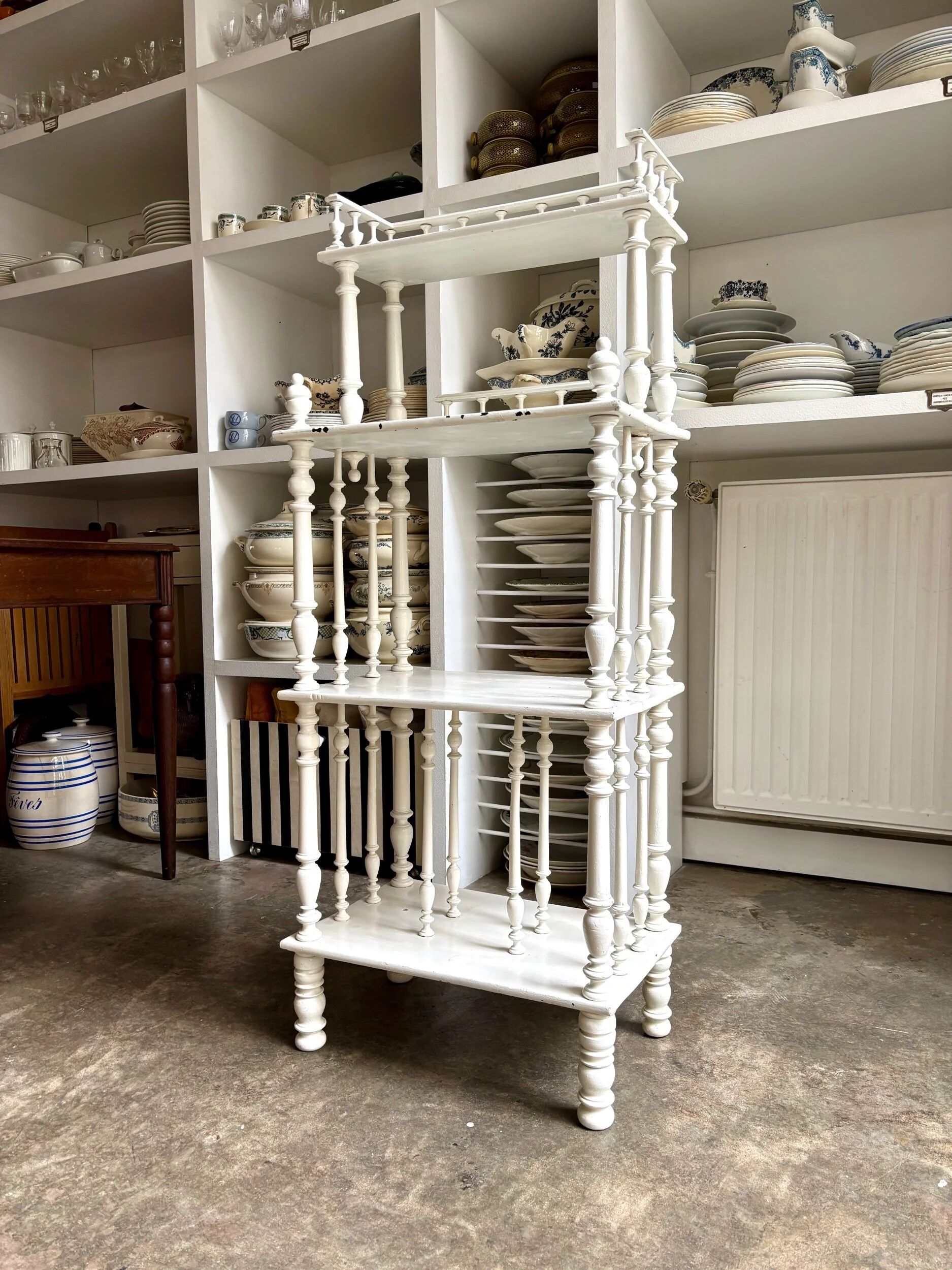 Library, white wooden sheet music cabinet.