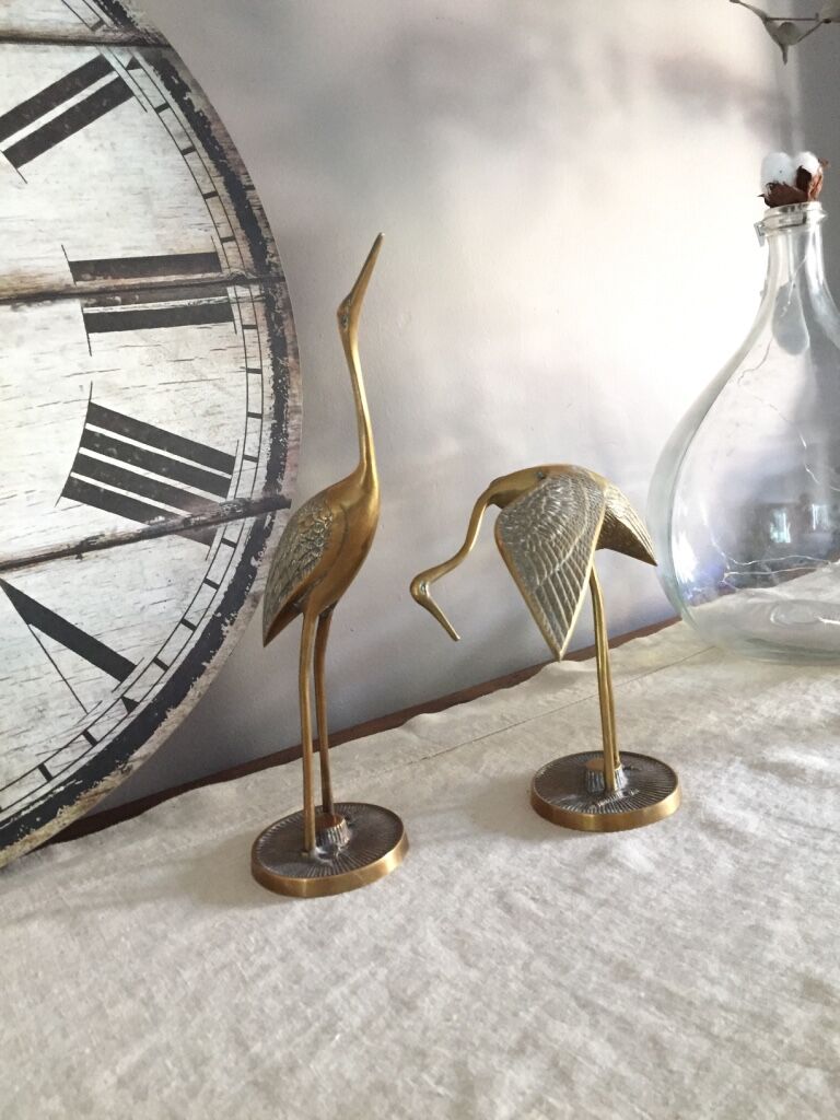 Couple of brass herons