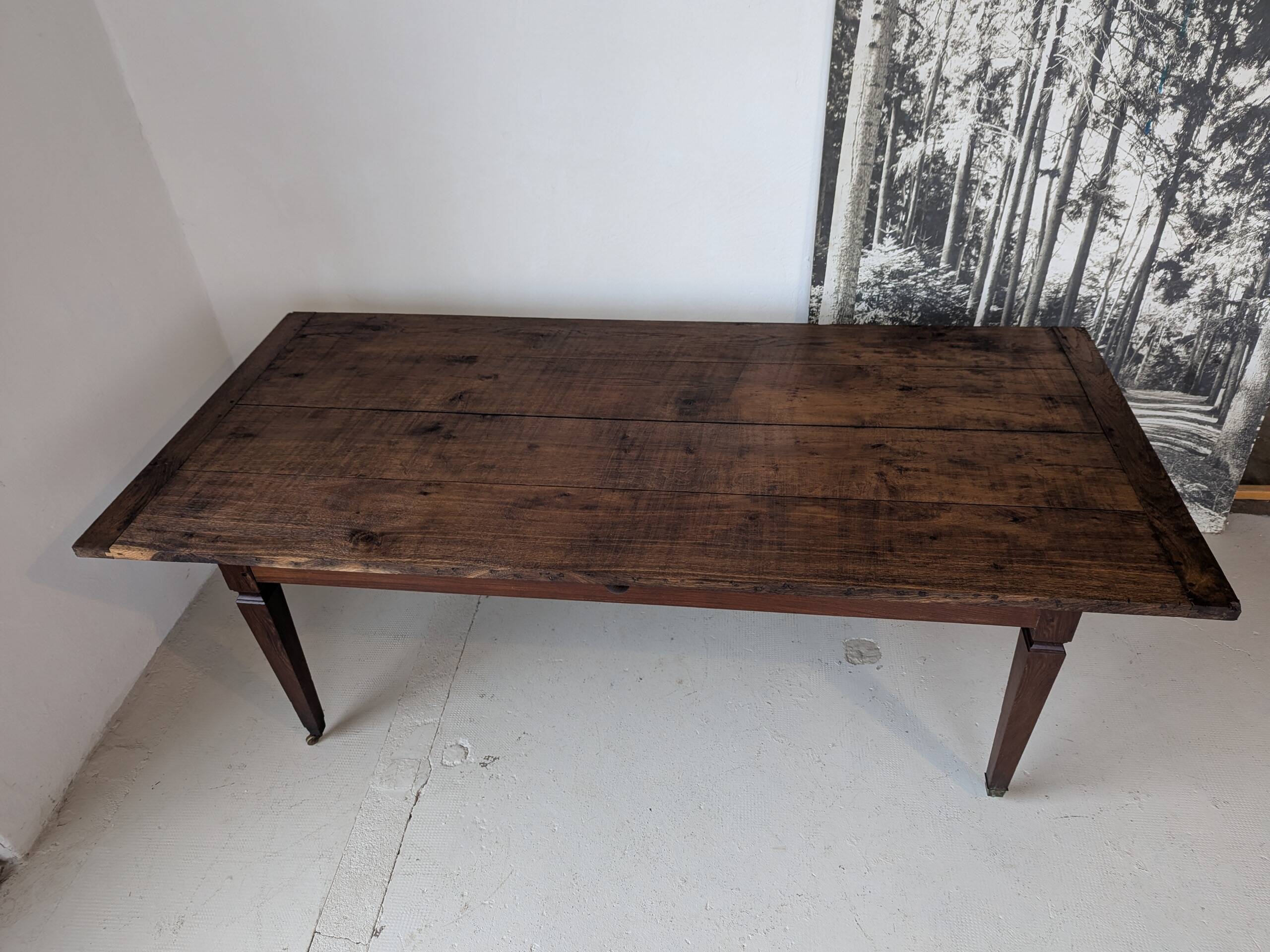 Campaign table in solid oak, Directoire style.