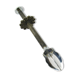 Sugar tongs in its case