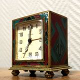 Zenith travel alarm clock with enamelled bronze case with Art Deco pattern