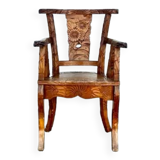 Fauteuil en teck poignardé à la main