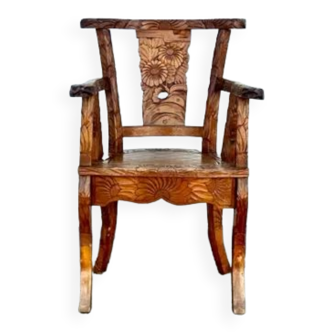 Fauteuil en teck poignardé à la main