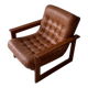 Vintage lounge chair in teak and leather from the 1960s.
