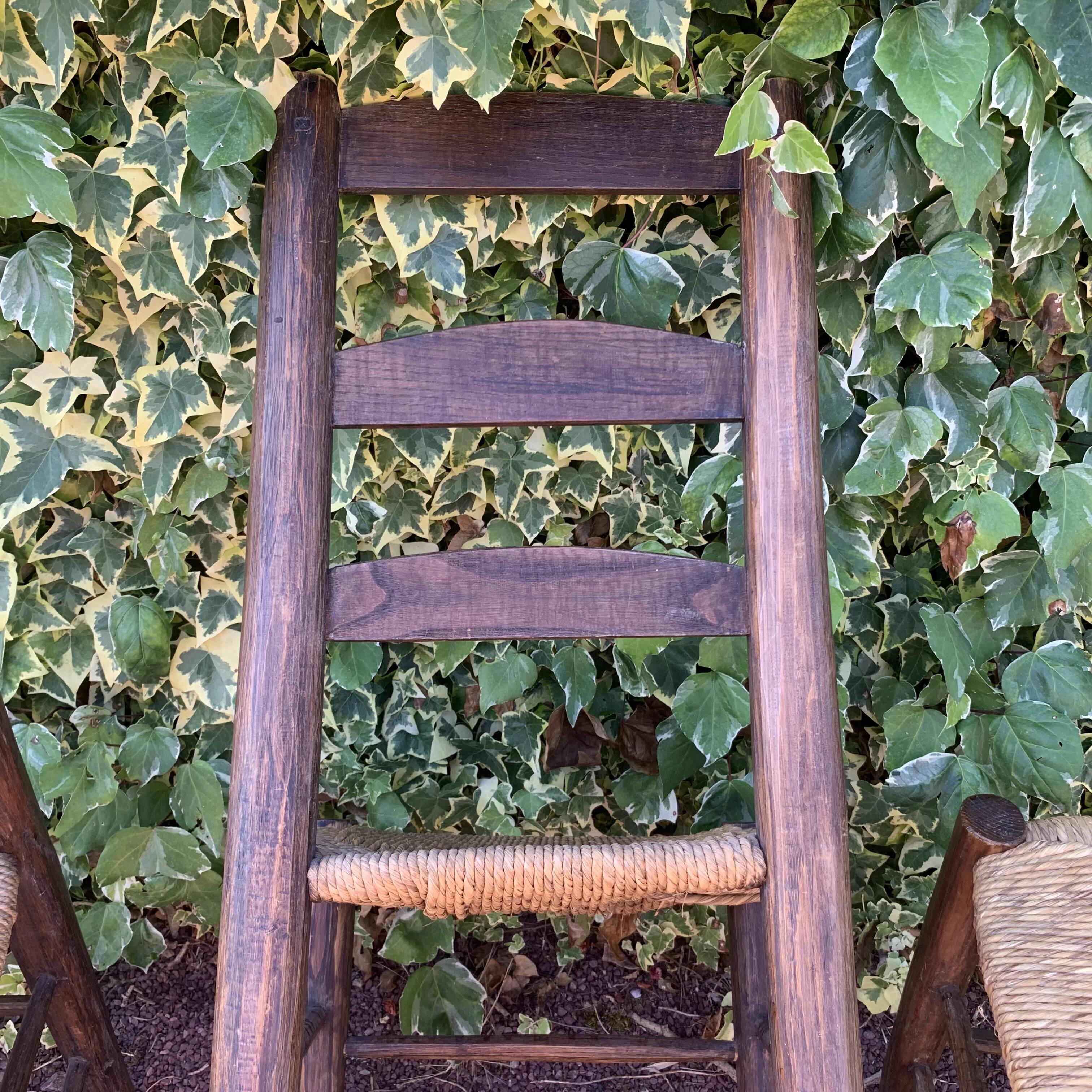Set of 4 handcrafted rush chairs in solid oak.
