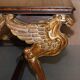 Double-sided writing desk in hardwood with gilt griffins, RJ Horner style.