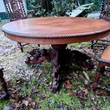 1850 oval hunting table with central legs with sculpted animals