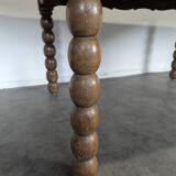 Dining table with turned oak legs.