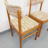 Pair of vintage Baumann chairs in wood and fabric from the 70s