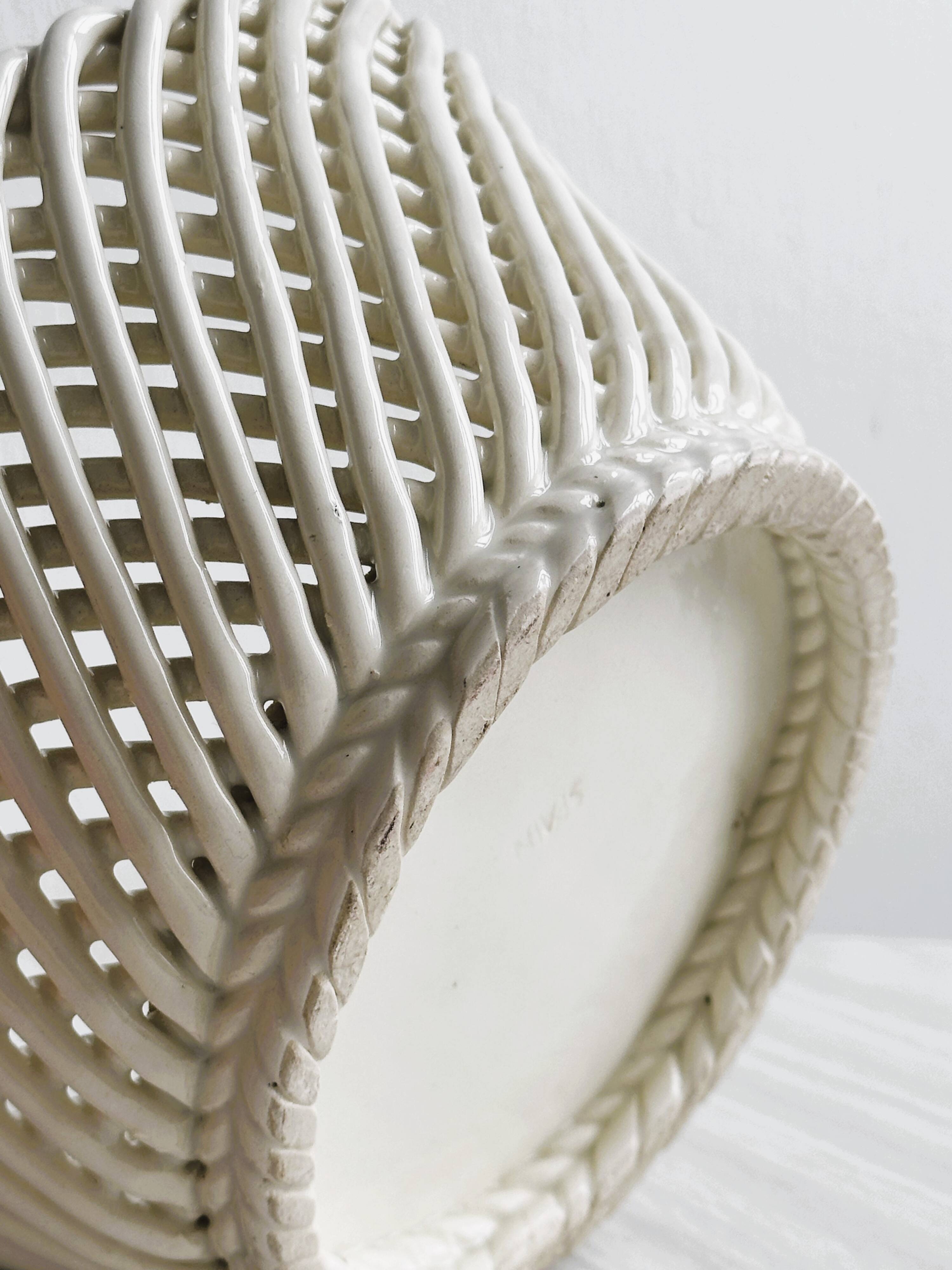 Bread basket - openwork white ceramic bowl.