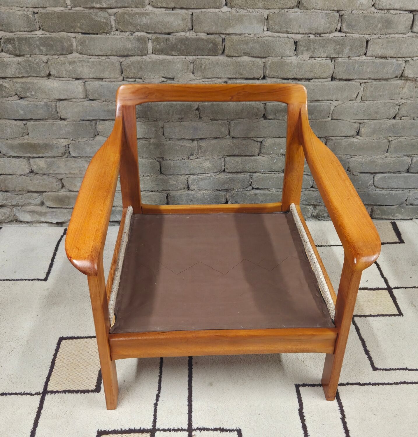 Danish canapé and its 1970s teak armchair
