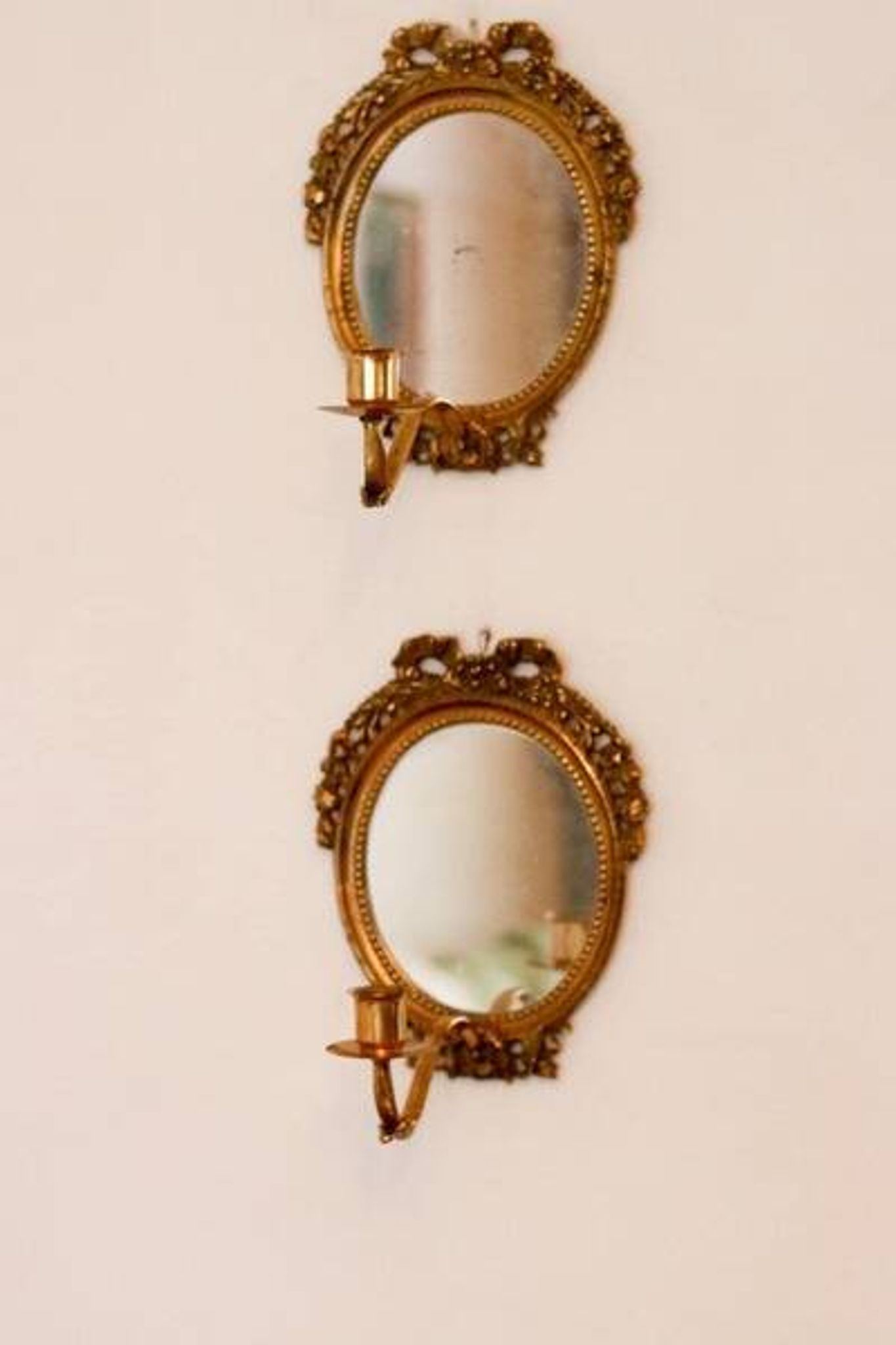 Pair of Swedish brass sconces with mirror