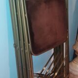 Set of four folding metal and velvet chairs