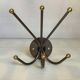 Small metal coat rack with six hooks