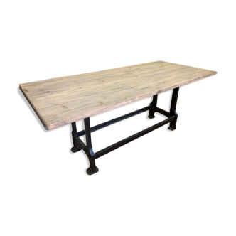Industrial design large wooden top table with cast iron legs