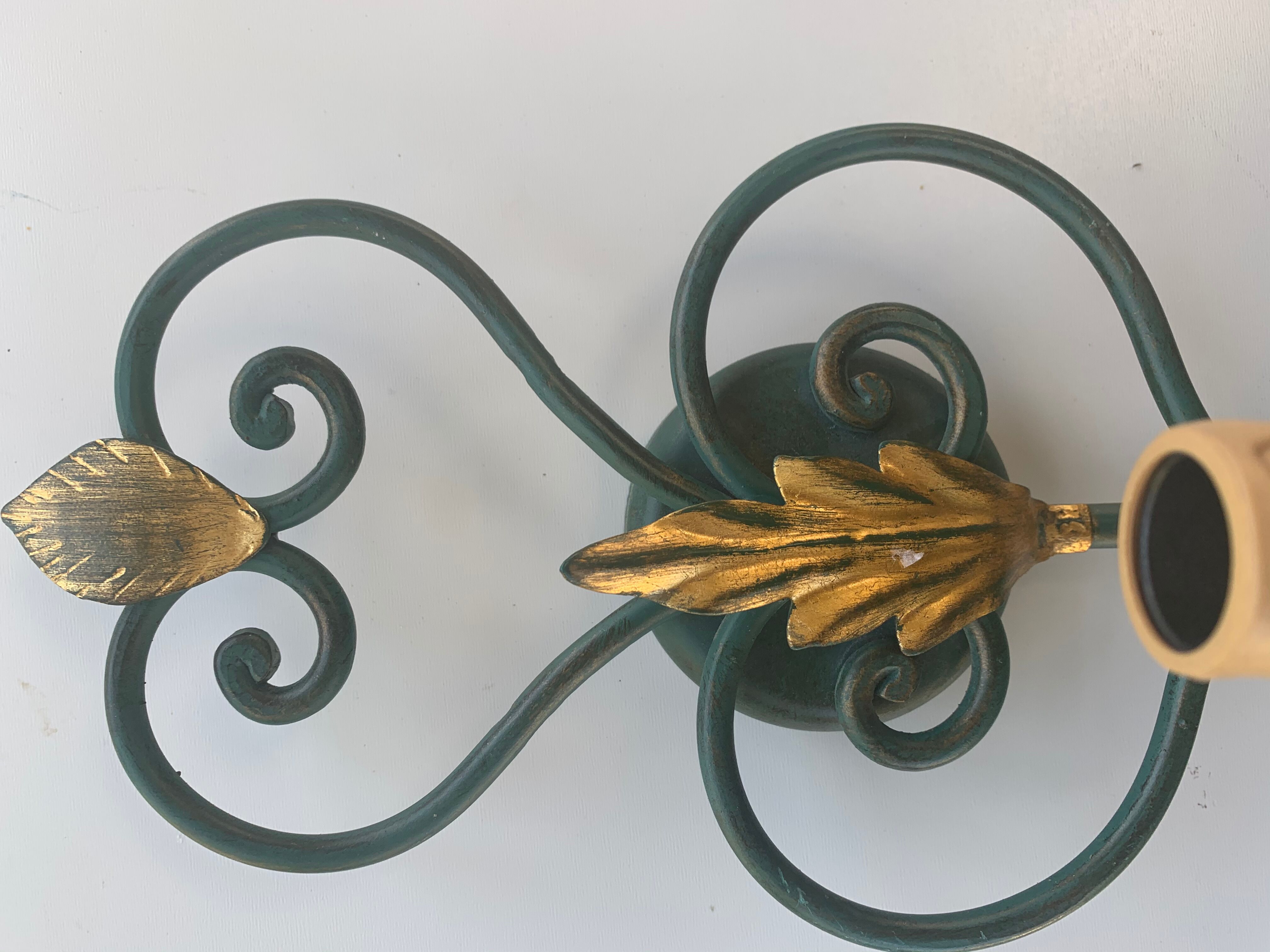 Green metal wall apply and vintage gold foliage