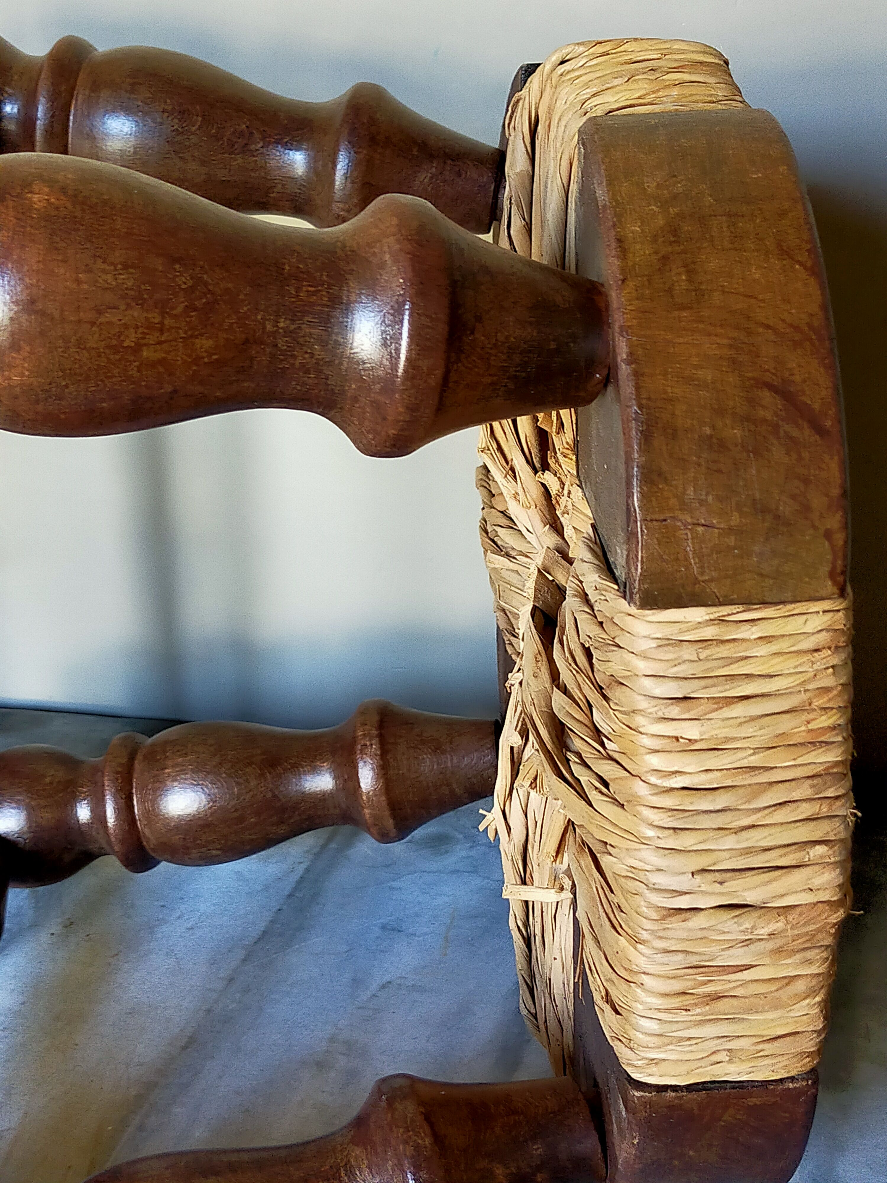 Low vintage regional stool in solid wood with straw top