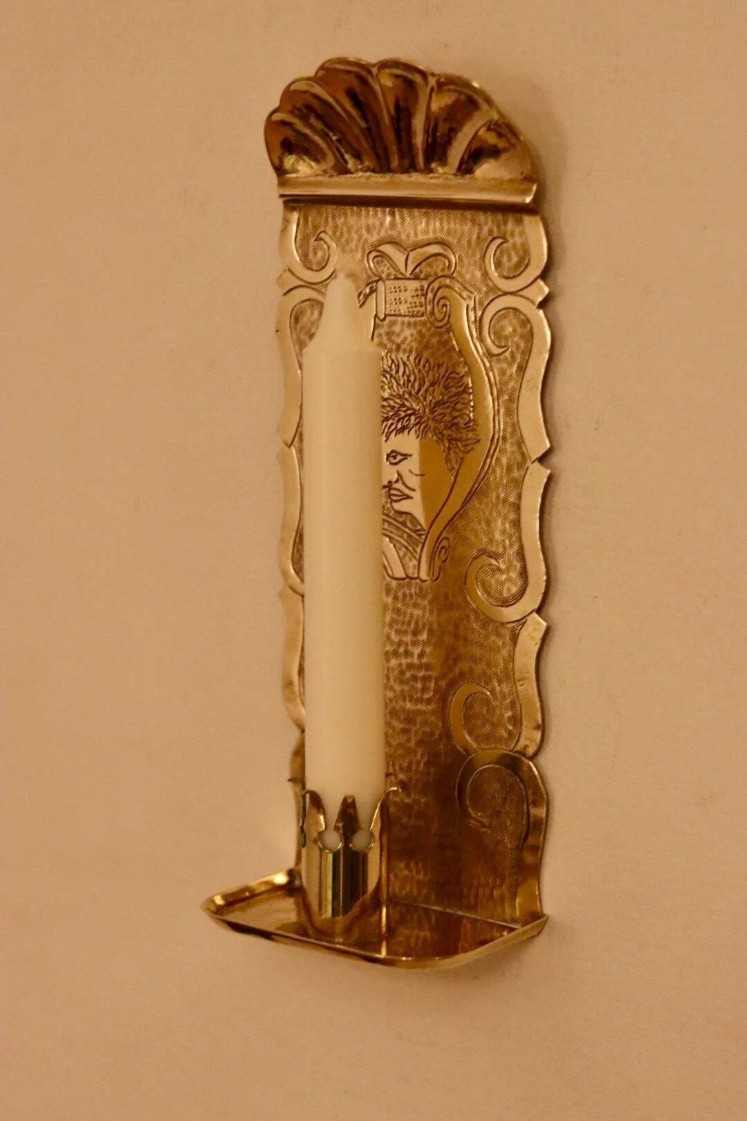 A pair of Swedish brass wall sconces from the mid-century.