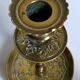 Duo of solid brass and gold metal candle holders worked old
