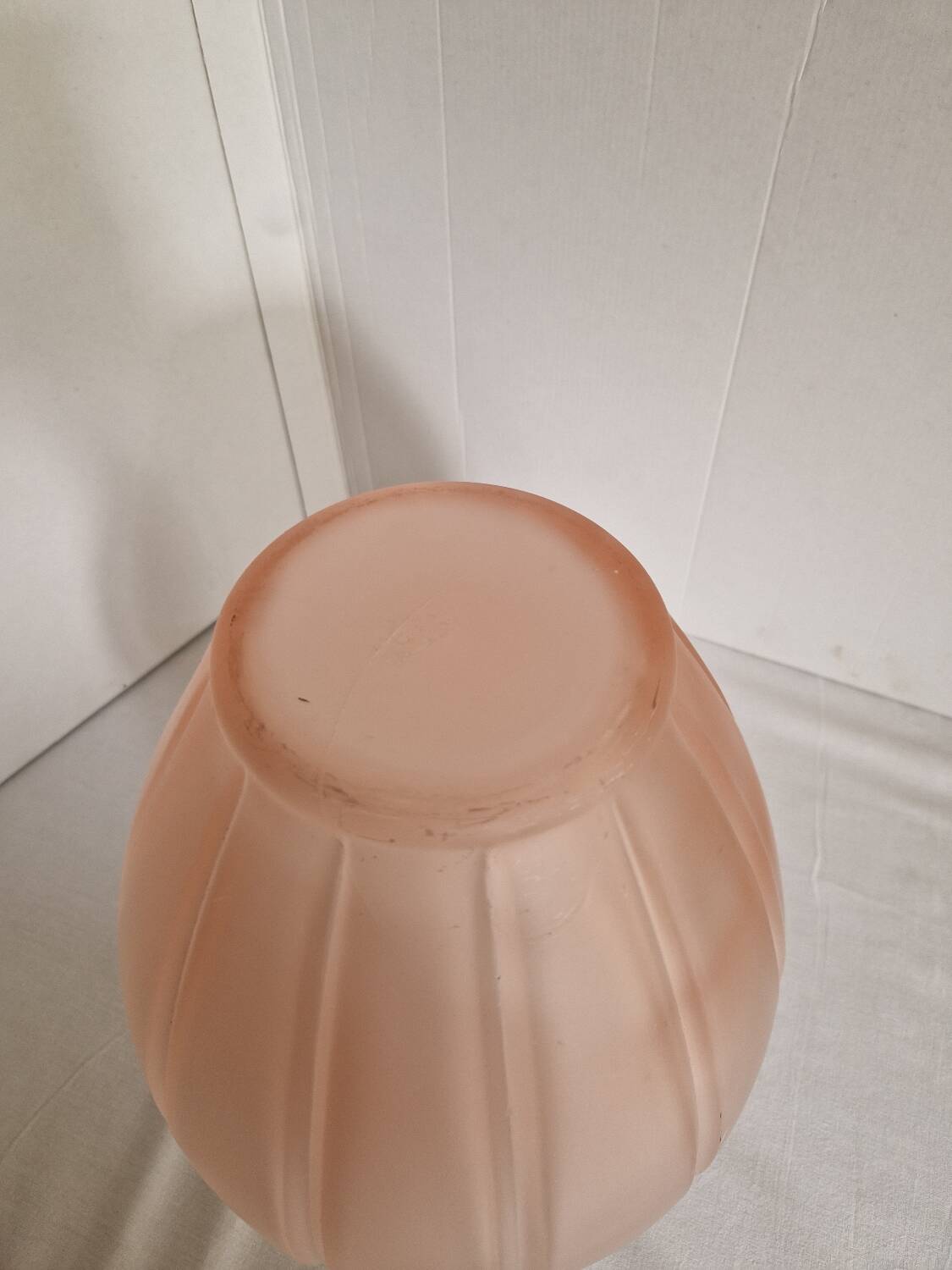 Large pink art deco vase in molded glass with flower decoration