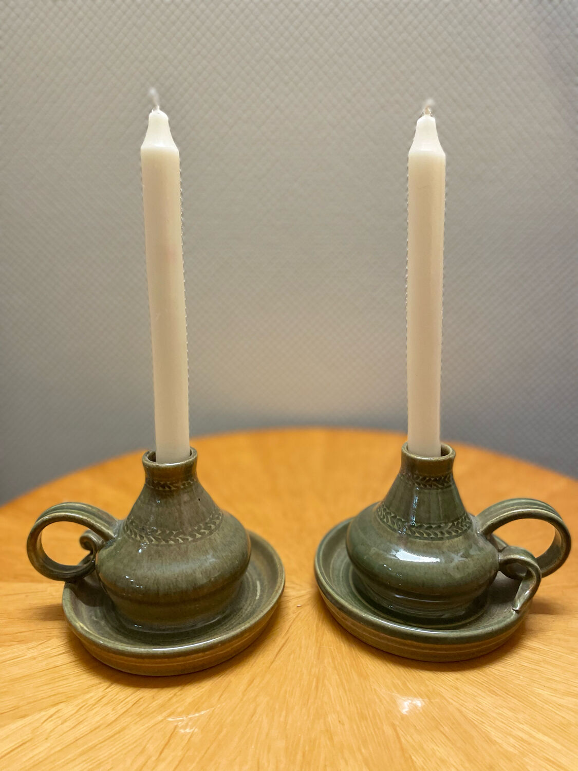 Pair of vintage glazed stoneware candle holders