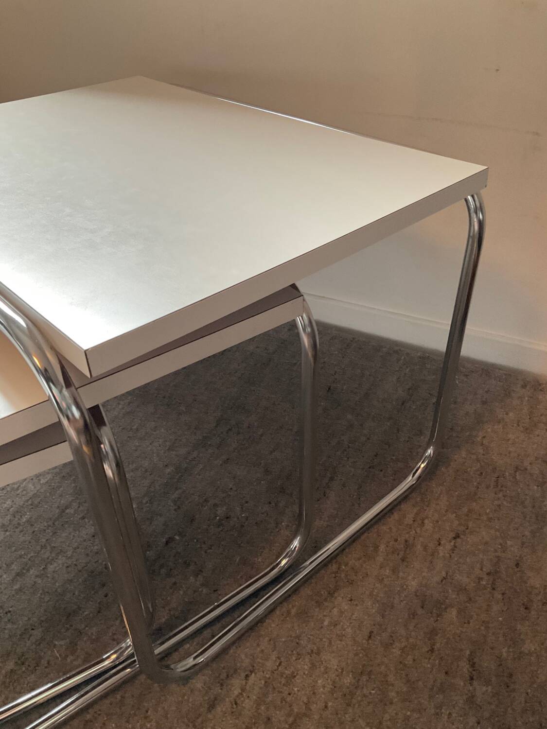 Trio of vintage nesting tables in Formica and chrome metal