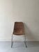 Chair made of rattan, wicker and chrome-plated metal