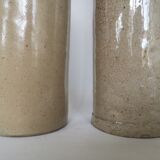 Pair of enamelled sandstone bottles