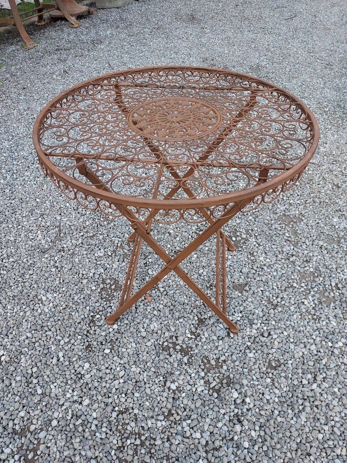 Garden furniture in brown patinated iron