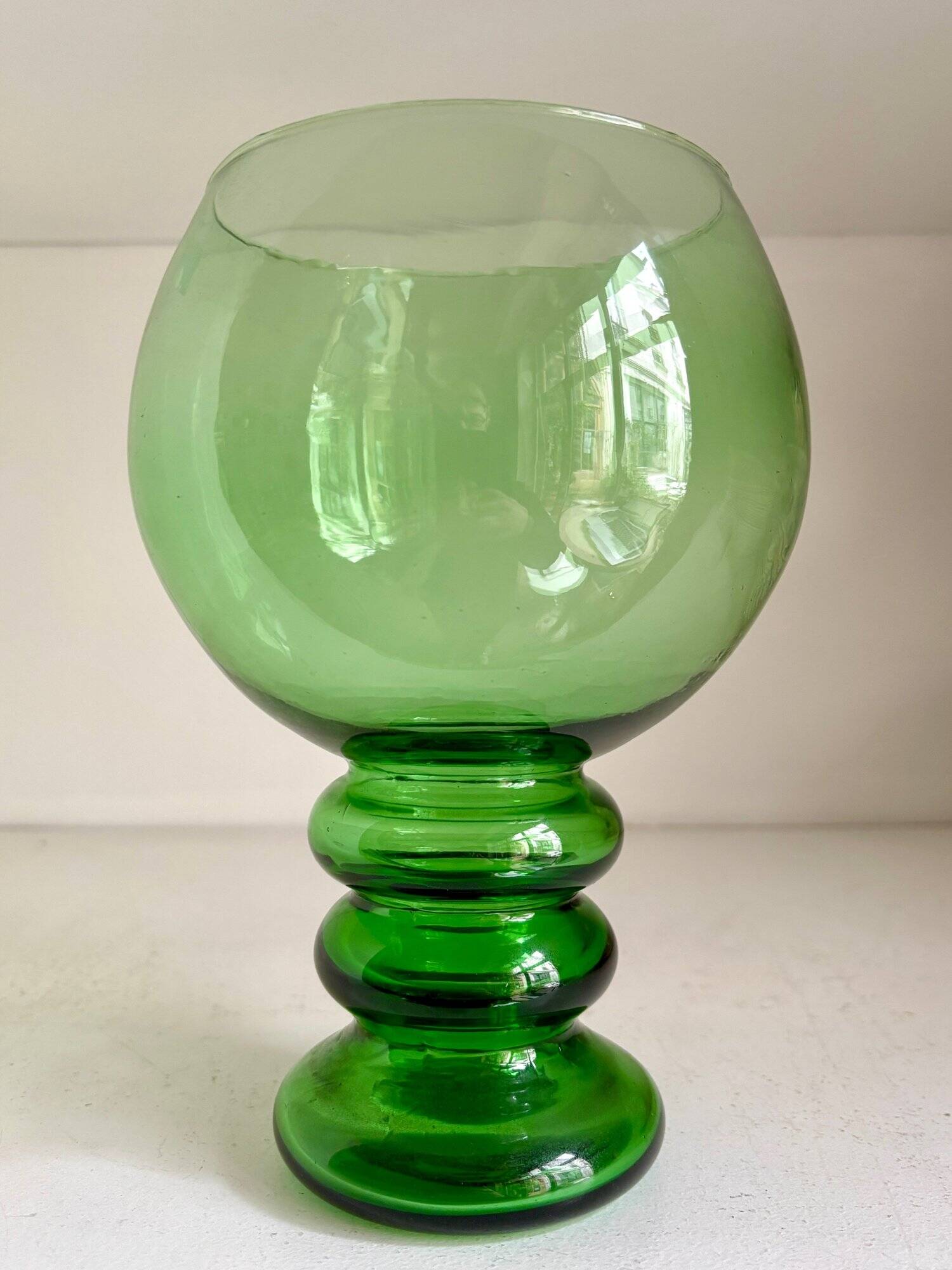 Green glass ball vase