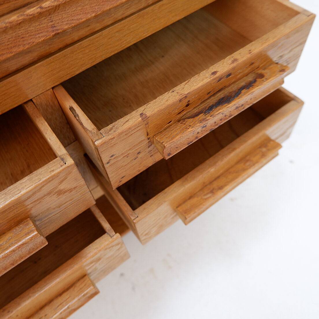 1960s wooden sewing cabinet with double-sided drawers