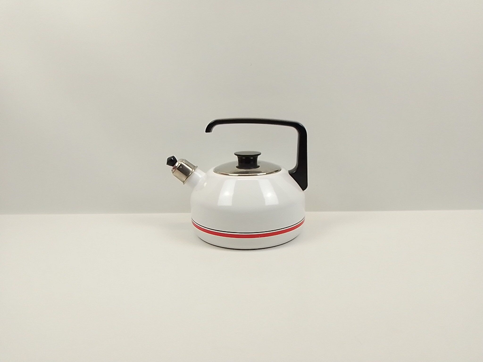 Enamelled kettle white border red and black