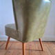 Vintage cocktail armchair, antique seating furniture.