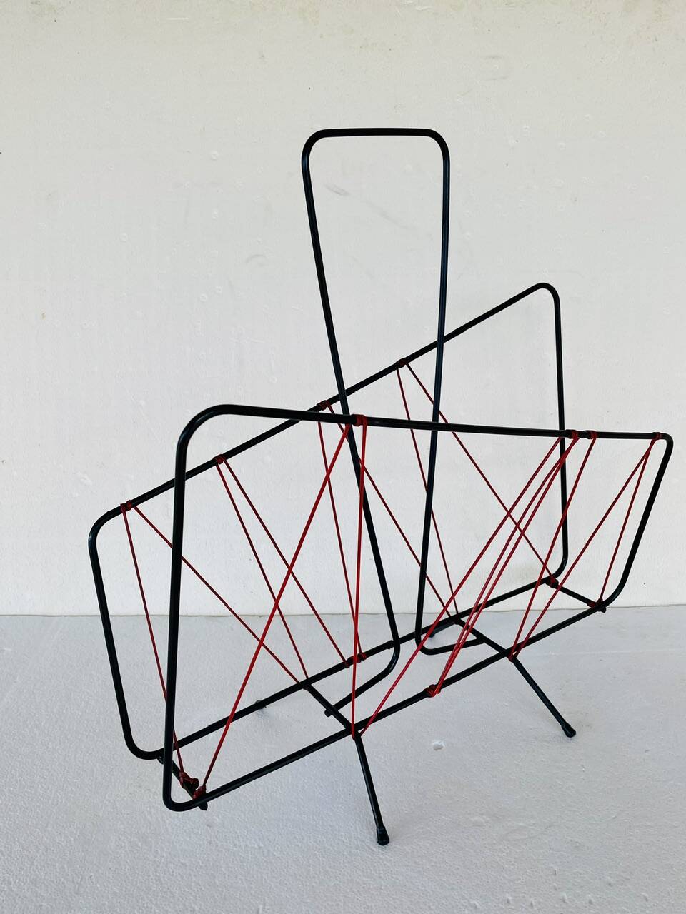 Vintage black metal magazine rack circa 19