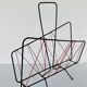 Vintage black metal magazine rack circa 19