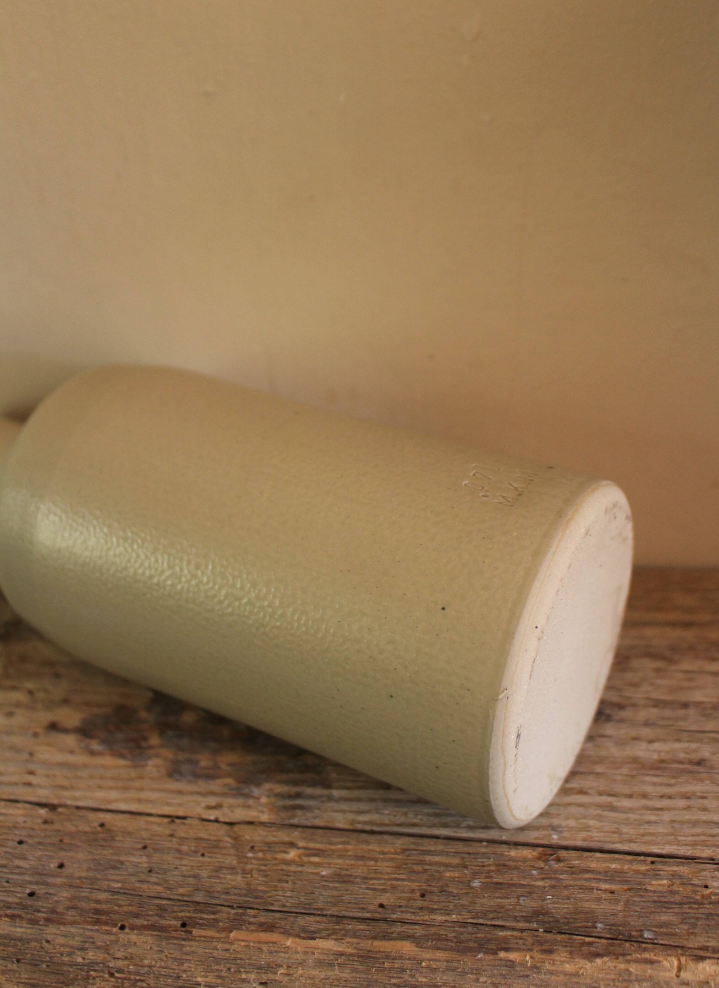 Vintage stoneware liqueur bottle