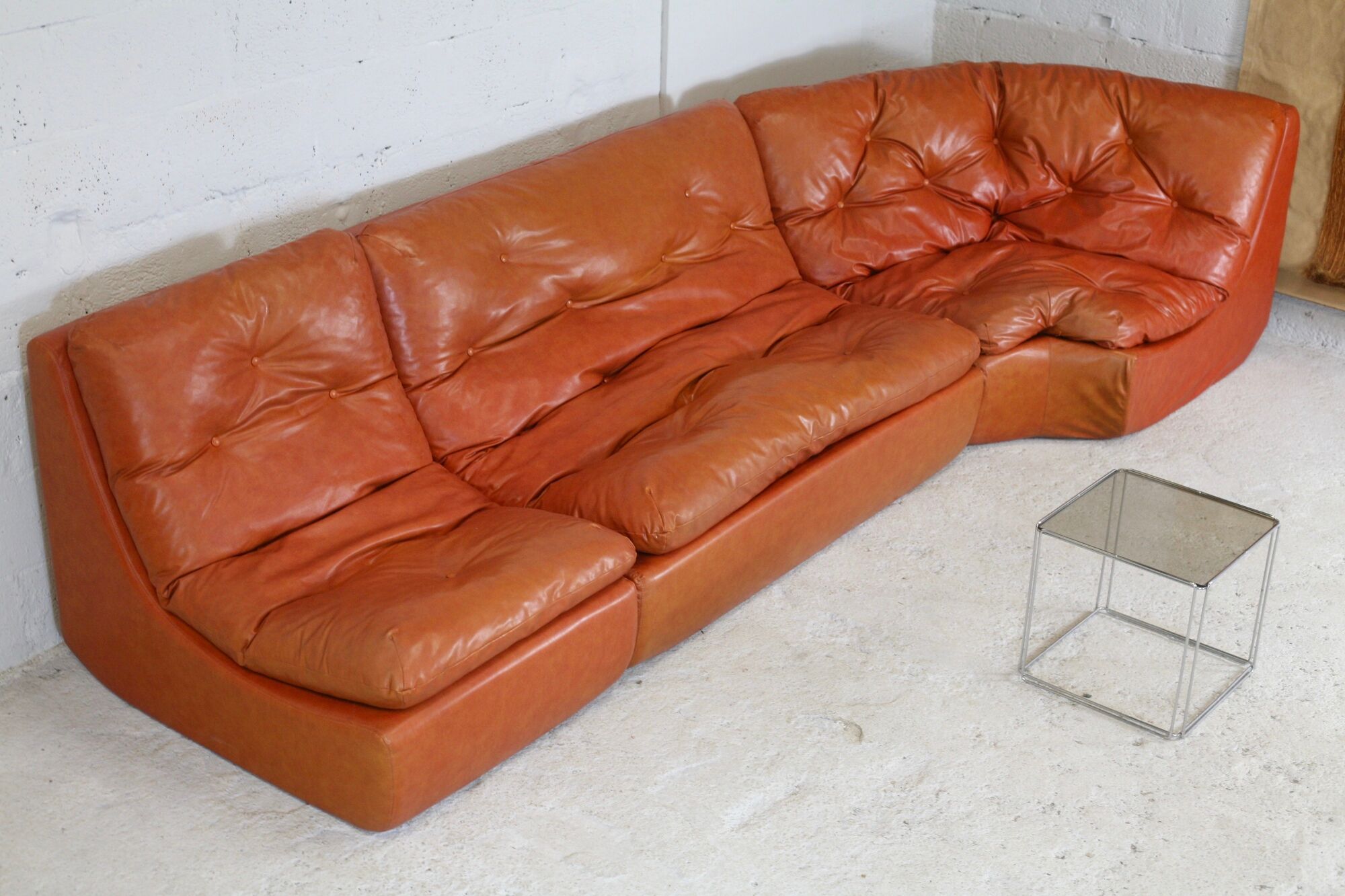 Flexible sofa, orange vinyl and foam, France, circa 1970
