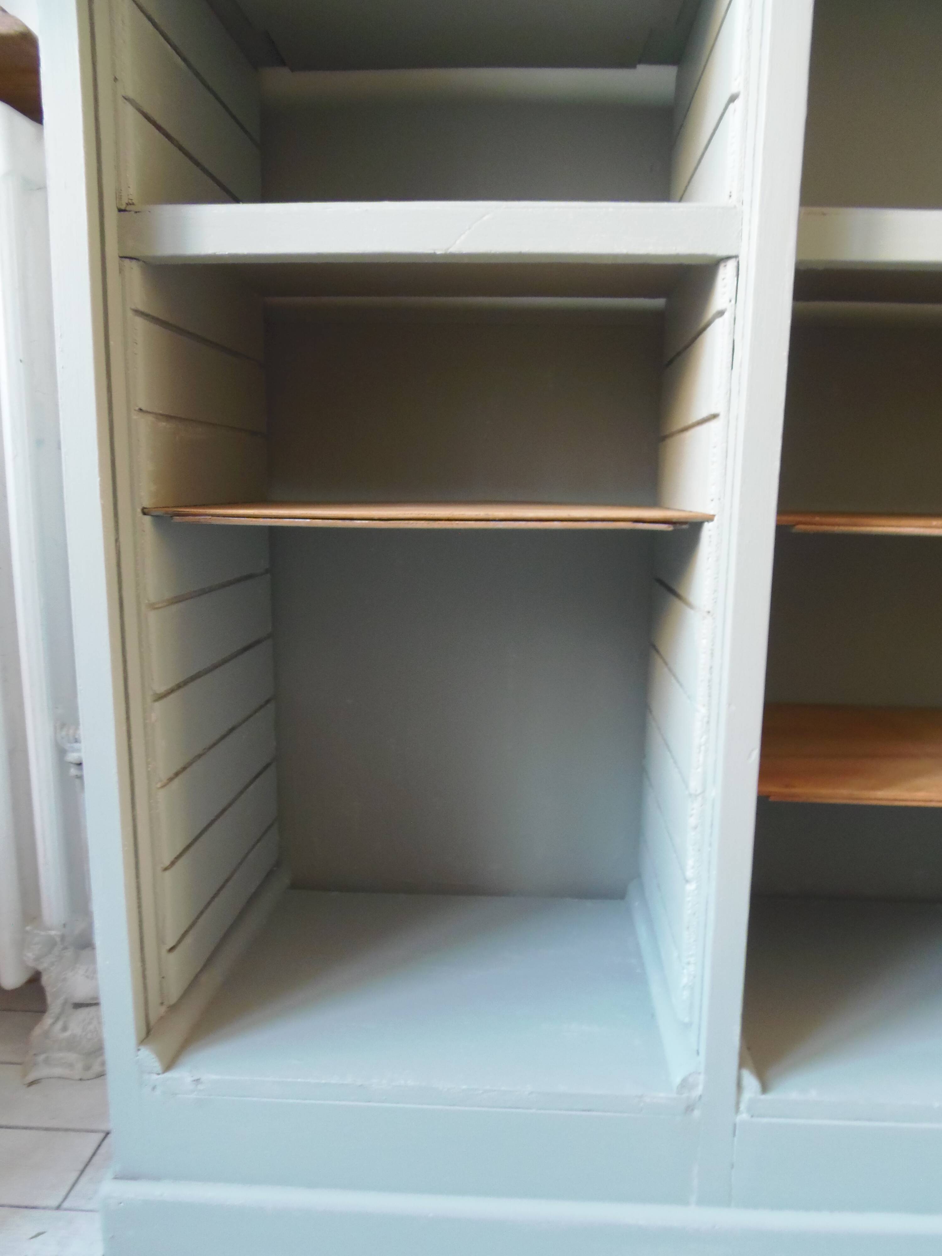 Vintage furniture transformed into a bookcase, verdigris patinated sideboard.