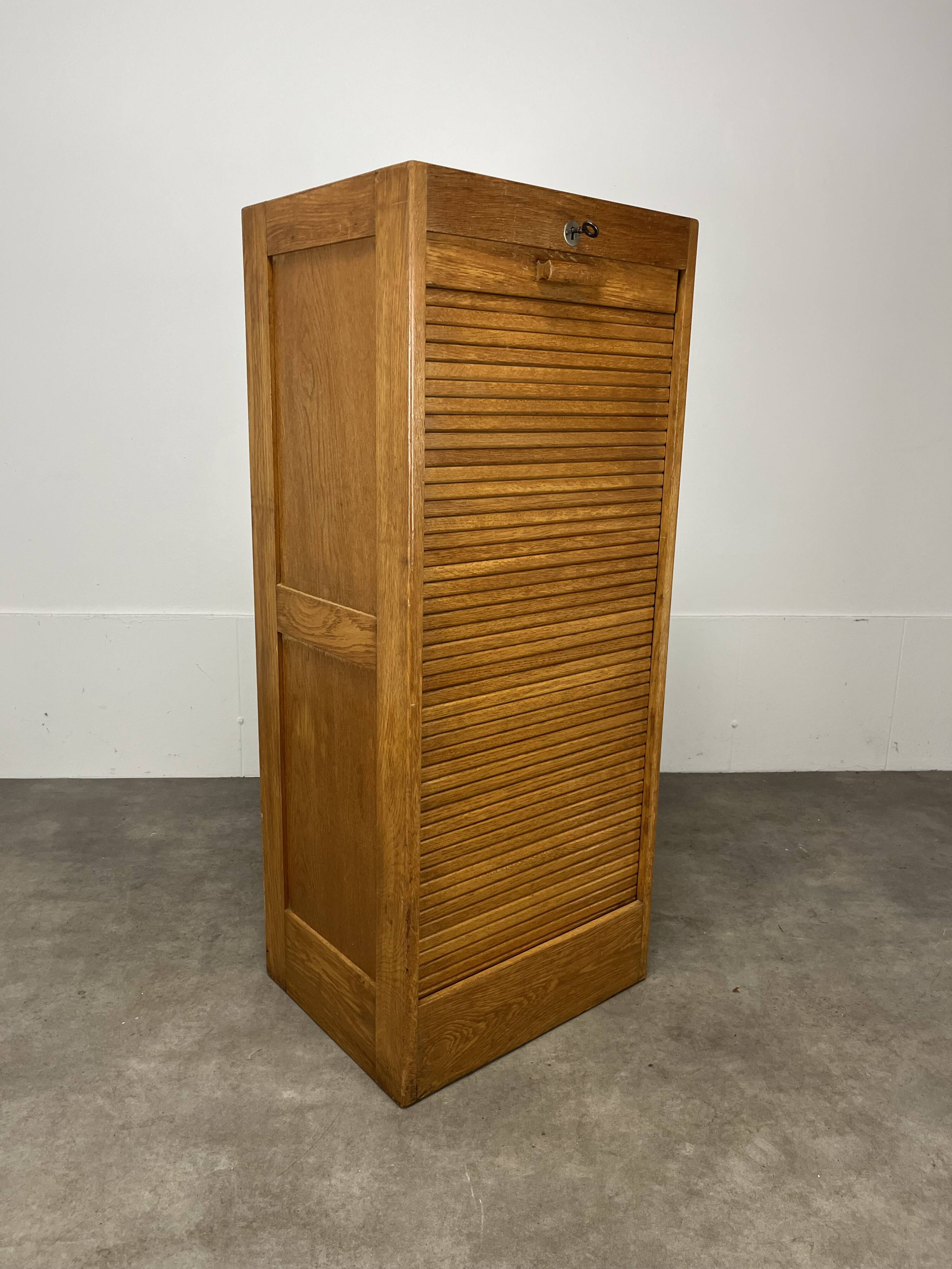 Filing cabinet with curtain, by trade