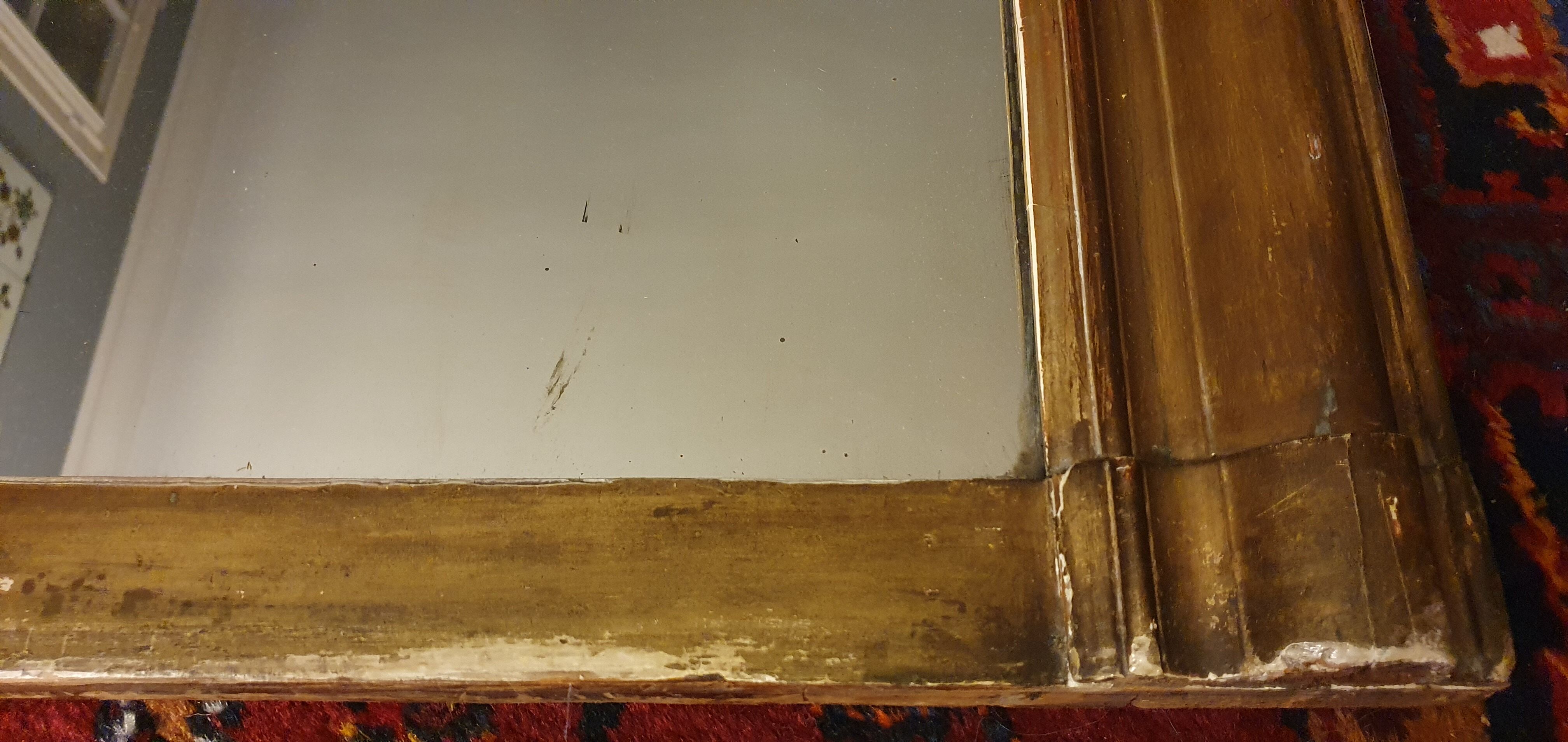 Large Louis Philippe mirror gilded with leaf. 137 x 99 cm.