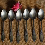 One of 6 silver-plated leafy metal soup spoons