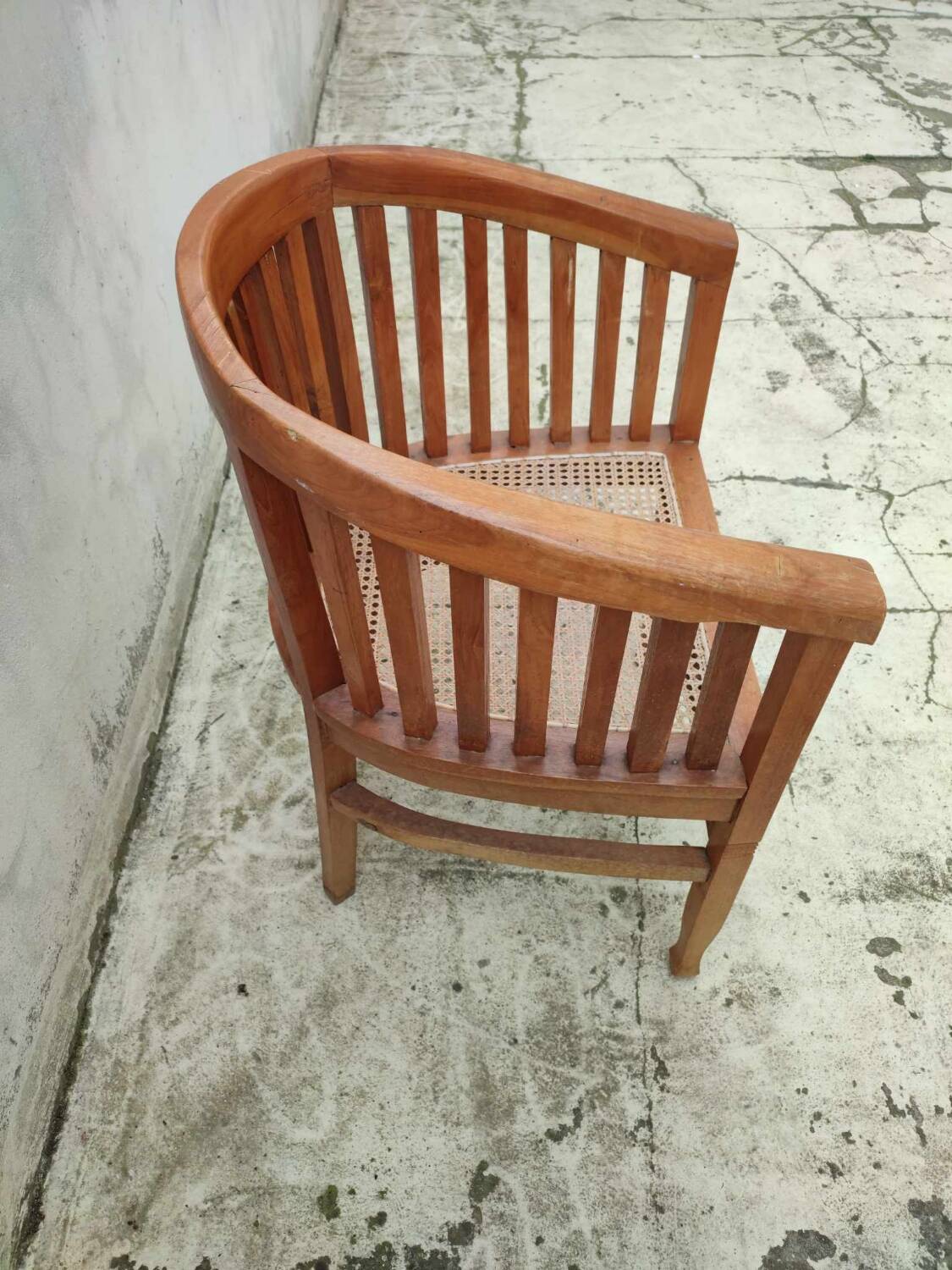 Old vintage teak wood cane armchair