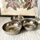 Servant in silver metal pine cone