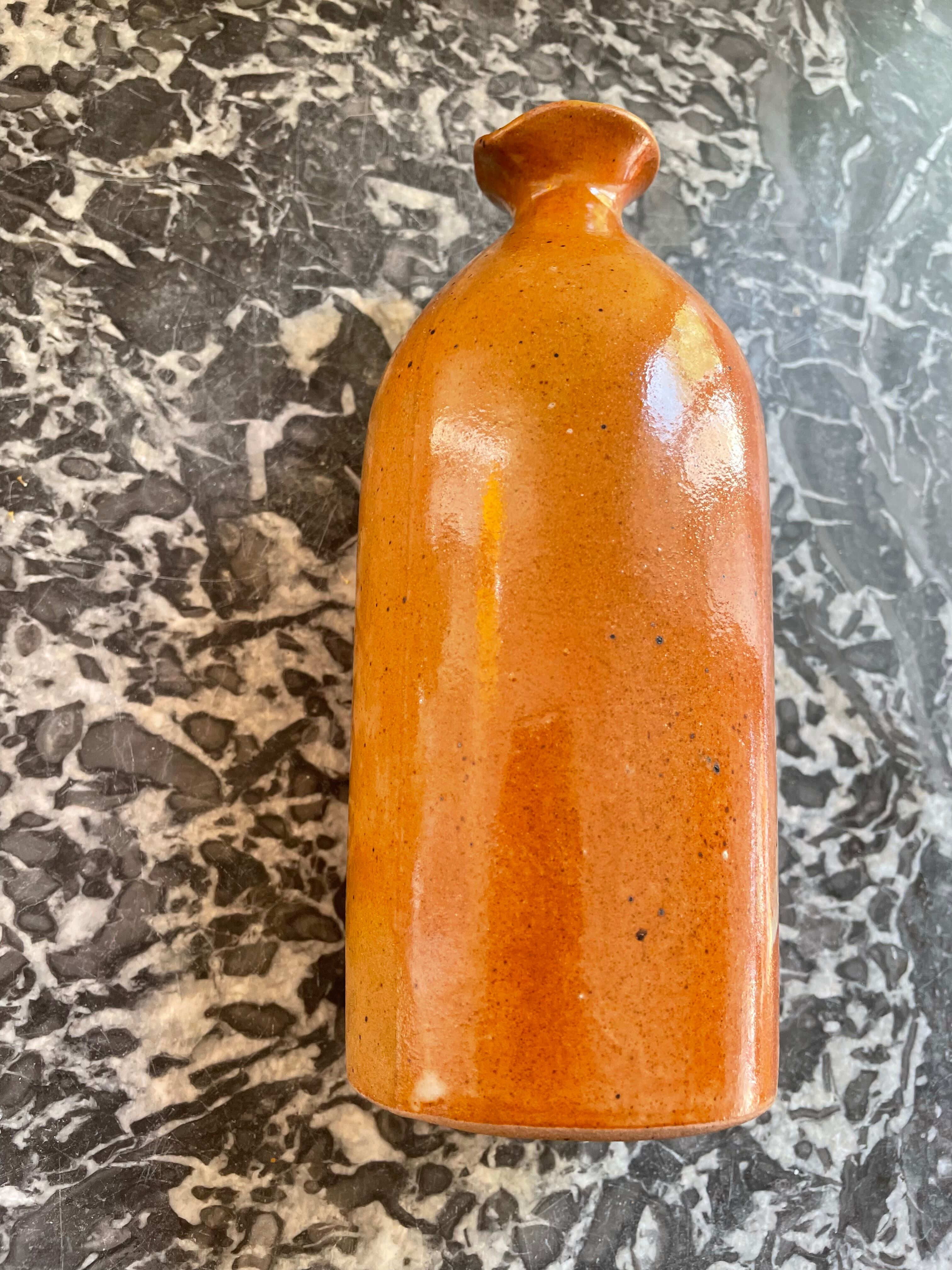 Sandstone liquor bottle