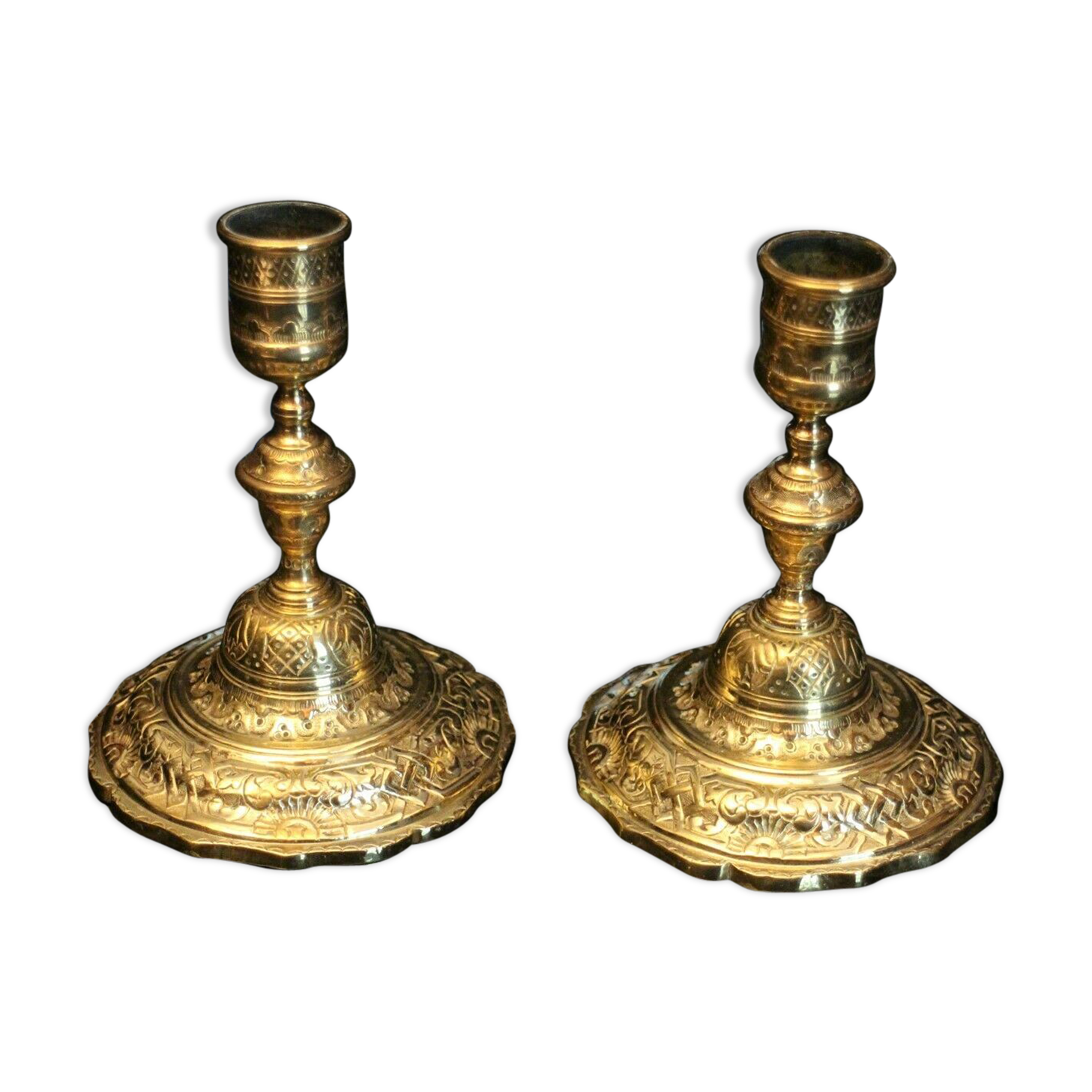 Pair of 19th bronze candlesticks with Regency-style chiseled decoration