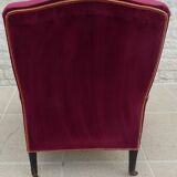 Bergère with blackened wooden legs on casters, Napoleon III period, velvet upholstery