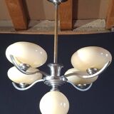 Chrome metal chandelier with 5 pale yellow opal shades from the 1950s.