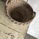 Set of 3 vintage brown wicker baskets from the 1960s, different sizes.